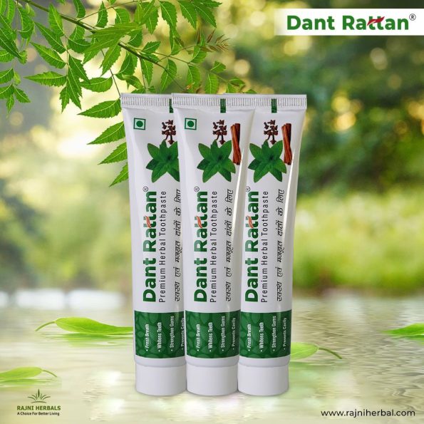 Pack of three herbal toothpastes for whitening, gum health, and cavity protection.